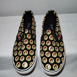 Black Slip-On Shoes with Yellow and Red Pattern